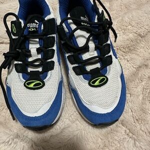 Puma Kids Sneakers in Blue, White, and Black with Neon Accents